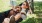 a person laying in a hammock with a dog Taryn at 401 luxury apartments Raleigh NC 