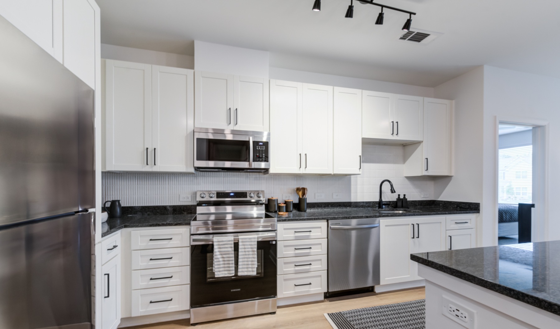 kitchen appliances and island Taryn at 401 Raleigh NC luxury apartments