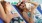 a couple of women in swimsuits by a pool Taryn at 401 luxury apartments Raleigh NC 