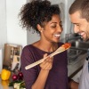a couple cooking dinner together Taryn at 401 luxury apartments for rent Raleigh NC